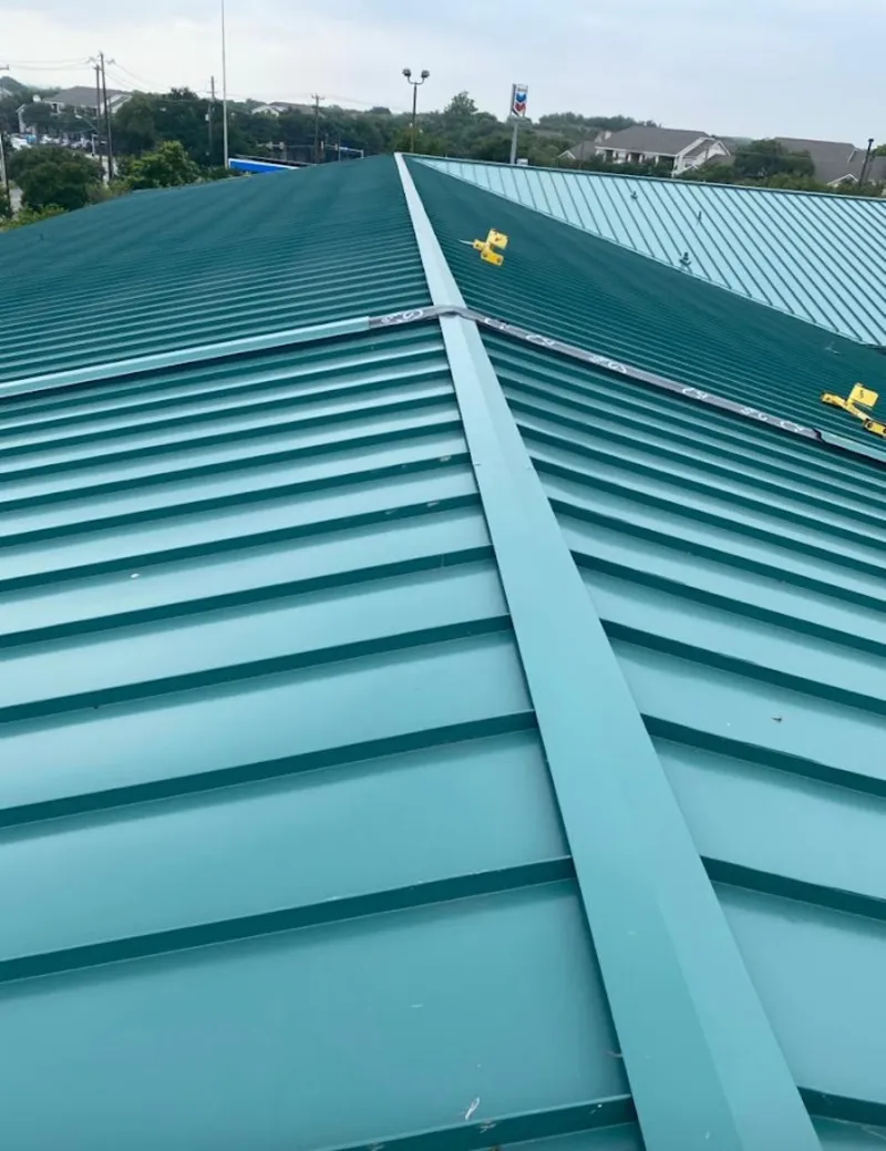 Green commercial metal roof ridge and valley for Metal Roof Repair in Hollidaysburg